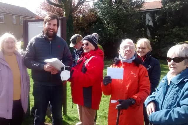 Mrs Heather Bennett and concerned residents of Bare present a petition for a pedestrian crossing to County Councillor Charlie Edwards, Cabinet member for Lancashire County Highways.