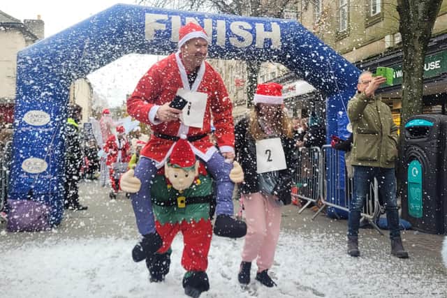 Runners in a previous CancerCare Santa Dash.