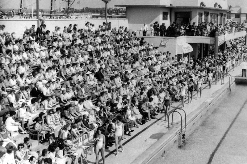 A packed stadium for a bathing beauty heat.