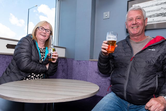 Christine Kelly and Paul Riding enjoying a drink inside the Embargo Craft Bar.