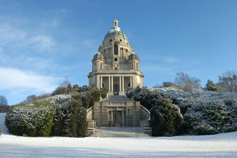 A lovely shot of the Ashton Memorial surrounded by snow covered trees in Williamson Park.