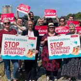 Cat Smith, pictured front, second from left, is demanding action from the Government and United Utilities over continued raw sewage dumping in Lancashire.