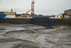 The raised broken hydraulic sea gate at Glasson Dock near Lancaster.