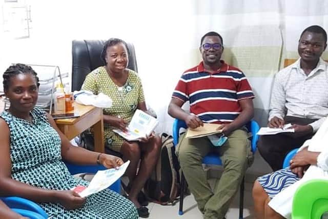 Dr Yakubu Salifu (second right) with members of the Palliative Care Team at Komfo Anokye Teaching Hospital in Kumasi, Ghana.