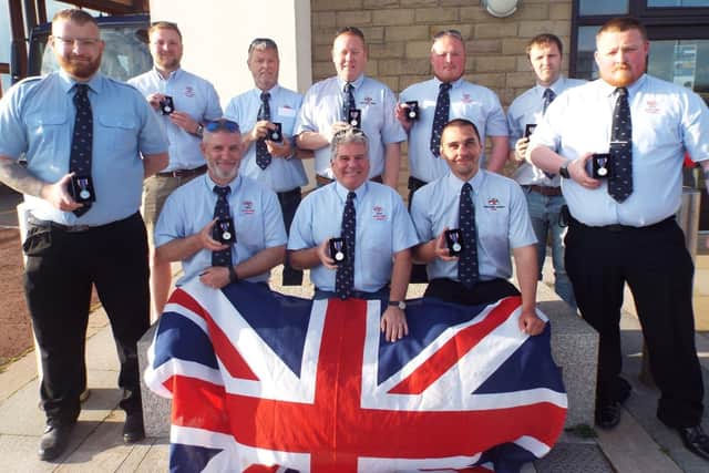 Members of Morecambe RNLI lifeboat crew who recieved their honours.