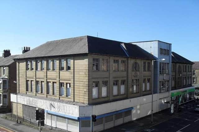 The Centenary house as it is today. There is still a Co-op store in part of the building.
