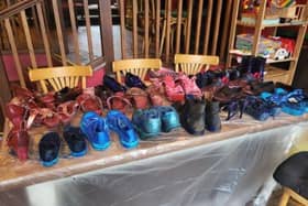 The collection of shoes ready for the 16 Days of Activism exhibition.