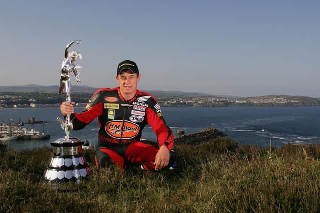 DOUGLAS, ISLE OF MAN - JUNE 07:  John McGuinness poses with the senior trophy during the Isle of Man TT (Tourist Trophy) Races on June 7, 2007 in Douglas, Isle of Man.  (Photo by Ian Walton/Getty Images)