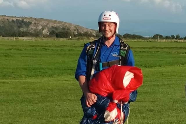 Jamie Hodgson after his solo skydive for charity.