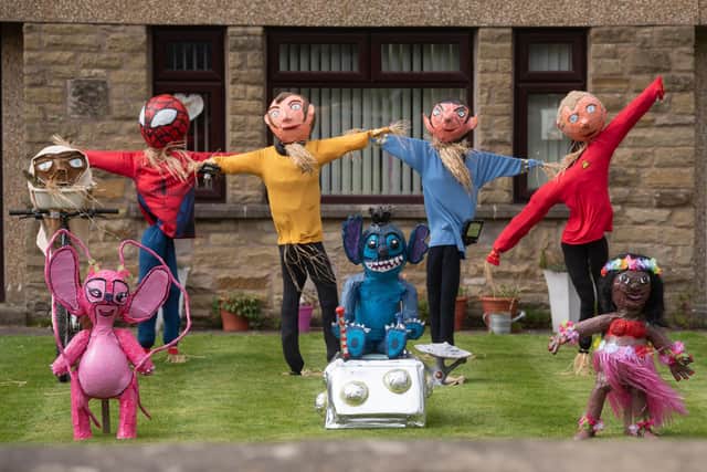 A selection of scarecrows from ET, Star Trek and Lilo and Stitch