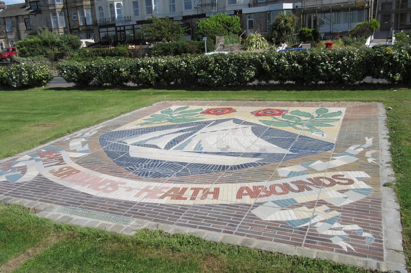 This has been Morecambe's motto since its tourism heyday. The town mosaic displaying the resort's crest and the motto, 'Beauty surrounds, health abounds', was originally situated outside The Arndale shopping centre where it was a draw for generations of children over the years, who enjoyed running up and down it from a young age. It underwent restoration work and was moved to its new home on the promenade in 2016.