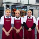 (Third from right) Memet Arap, known as Mario, the owner of Napoli Pizzeria and Grill in Lancaster with his staff outside the shop. Photo: Kelvin Lister-Stuttard