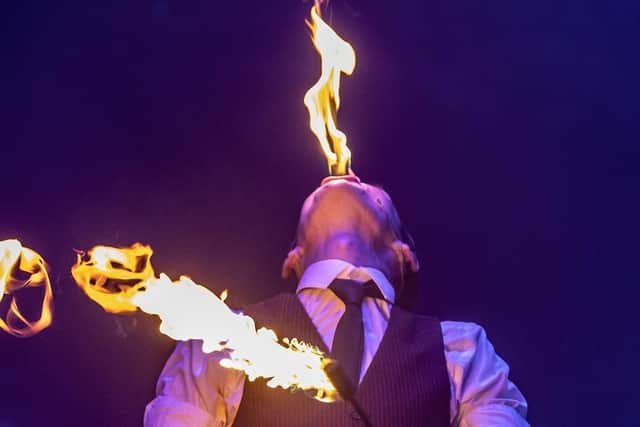 Circus skills expert Michael Jordan from High Jinx fire-eating.