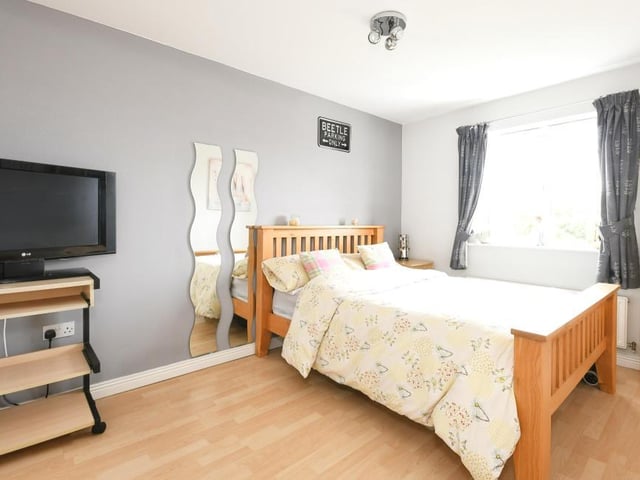 Like the master, the second bedroom overlooks the front of the Forest Town property. Again, size is definitely not an issue, and the room features fitted wardrobes.