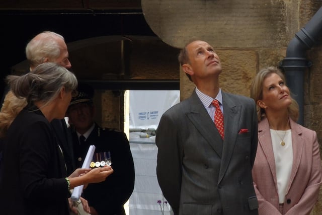 The Earl and Countess of Wessex admire the castle surroundings.