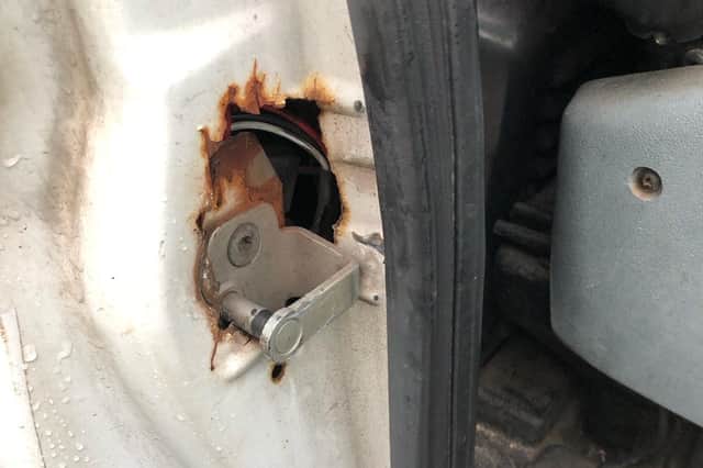 The van driver could have fallen out of his vehicle because the driver's door lock was corroded. Picture from Lancs Road Police.