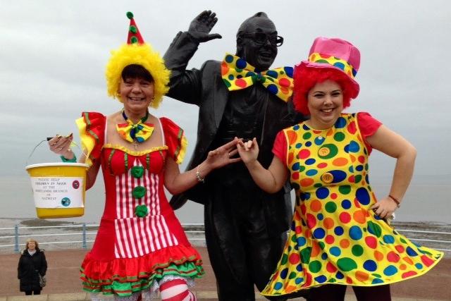 Staff from Natwest in Morecambe Margaret Dickinson and Sharon Jones dressed up as clowns to raise money for Children in Need. The duo are pictured at Eric Morecambe's statue which was also dressed up for the day.
