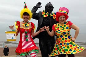 Staff from Natwest in Morecambe Margaret Dickinson and Sharon Jones dressed up as clowns to raise money for Children in Need. The duo are pictured at Eric Morecambe's statue which was also dressed up for the day.