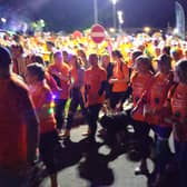 A crowd of participants setting off at a previous Moonlight Walk for St John's Hospice.