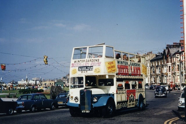 I used to love riding on the old open top buses when I was going up to Heysham Head (as advertised on this one). Note also the ads for the Dixieland Showbar at the Winter Gardens, I recall some good nights in there! From the other vehicles I'd guess this was taken in the 1960s.  