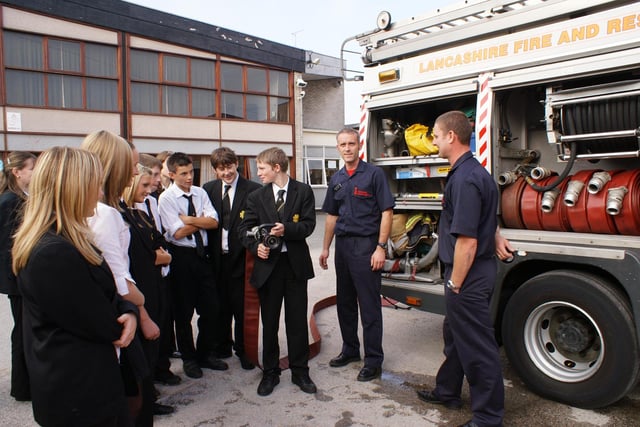 Schoolchildren have been rubbing shoulders with the fire brigade as part of their GCSE science course. Fire crews visited Lytham St Annes High School to teach Year 10 pupils about fire prevention, how to use a fire extinguisher, and fire safety procedures