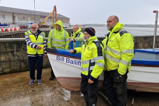Competition winner Ian Steele with Simon Ward, Rick Hoyle, Phil Smith and Andy Pawley from Lancaster Port Commission, who restored the boat.
