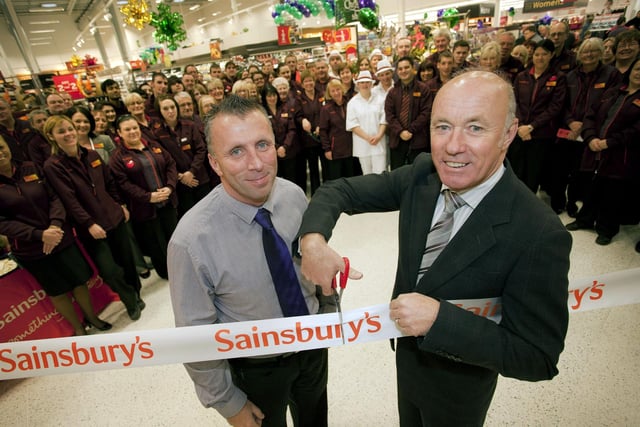 Store manager Martin Corban (left ) and Morecambe FC manager Sammy Mcllroy at the opening of Sainsbury's supermarket in Morecambe.