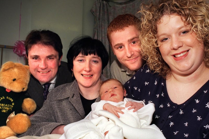 MPs Hilton Dawson and Geraldine Smith make a joint Christmas visit to the Royal Lancaster Infirmary, seen here meeting Garry and Nicola Dean with their new born Olivia Jasmine.