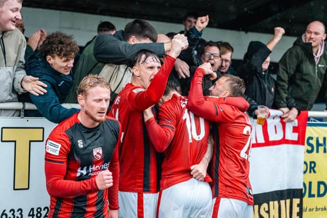 Morecambe celebrate an fine 3-1 win over Merthyr Town (photo: Morecambe FC)