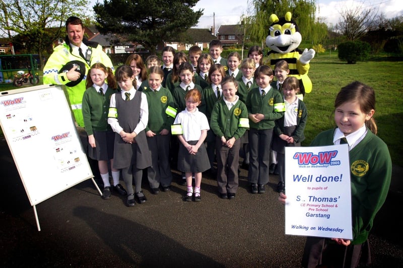 Grace Brindle, eight, and other children with PC Steve Lancaster and 'Bee seen be safe', from Lancashire Partnership for road safety, at St Thomas's CE school, Garstang, at the launch of the new walk to school initiative.