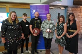 Lancaster EE win the Charity Challenge Crown 2023 sponsored by the Lancaster Guardian with editor Debbie Butler (second from right).