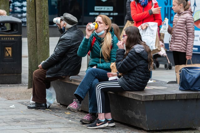 Shoppers take a well-earned break in Lancaster after lockdown restrictions are relaxed.