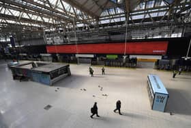 Police Office and National Rail Staff are seen at an empty Waterloo Station in London (Photo: Alex Davidson/Getty Images)