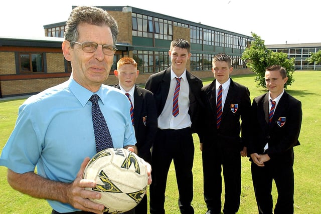 Frank Donnelly, who is retiring as chairman of Lancashire Schools FA. He is pictured at Cardinal Allen Catholic High School, Fleetwood, with current Blackpool Town Team players (from left) Michael Davies, Christian Dust, Jamie McKenna, and Steven Hastings