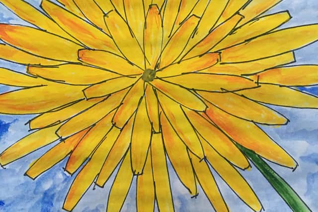 One of the dandelion paintings ready to receive donations and be placed on the ceiling of dreams at the Queen's Market in Morecambe.