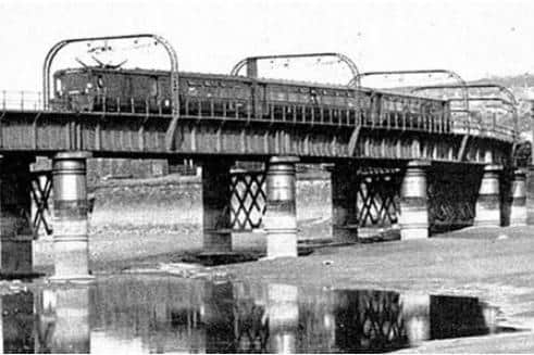 Electric passenger train crosses Greyhound Bridge en route to Morecambe and Heysham. Photo courtesy of Lancaster Past & Present