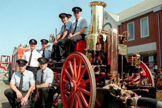 Firefighters from Fleetwood Station trying out an 1898 Shand-Mason horse-drawn engine at Tram Sunday