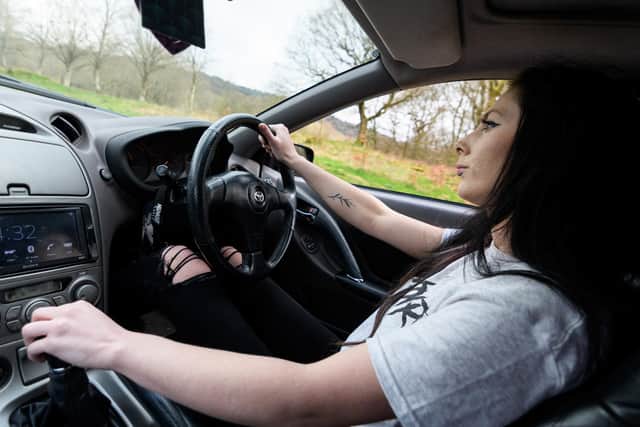 Misha Rogers pictured at the wheel of her  adapted Toyota Celica T-sport Photo: Kelvin Stuttard