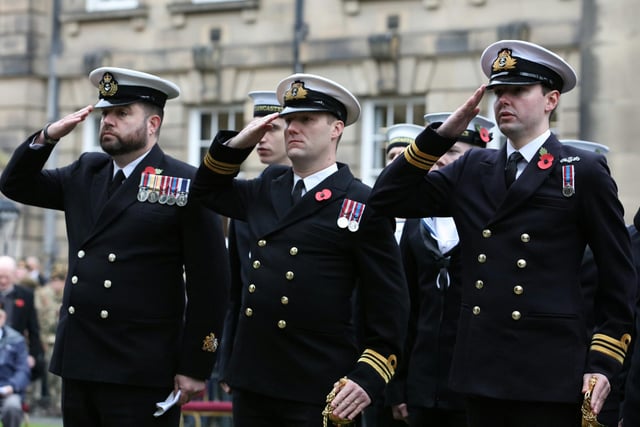Saluting on Remembrance Sunday in Lancaster.
