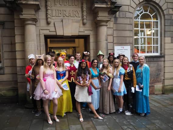 A group of young people dressed as their favourite Disney characters and did a conga through the streets of Lancaster to raise awareness of Metamorphosis Open Cinema.