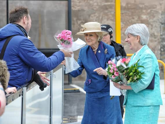 Princess Alexandra meets residents who gathered to see her at the opening of the community fire and ambulance station.