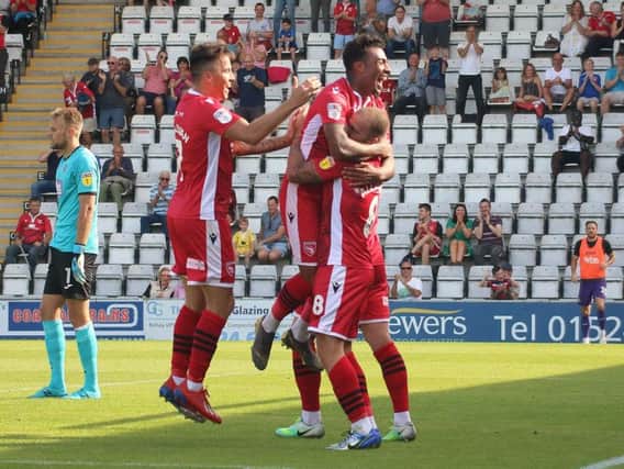 Lewis Alessandra celebrates his second goal against Exeter.