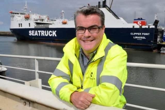 Alistair Eagles, chief executive officer of Seatruck Ferries, in front of the Riverdance's replacement, Clipper Point