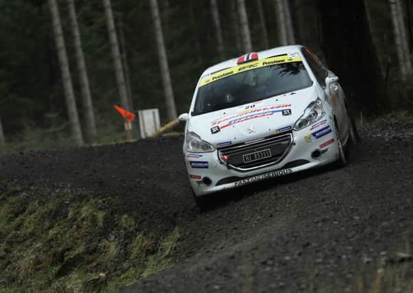 Steve Rokland/Tom Woodburn in their Peugeot 208 R2 in Carlisle. Picture: Jakob Ebrey Photography