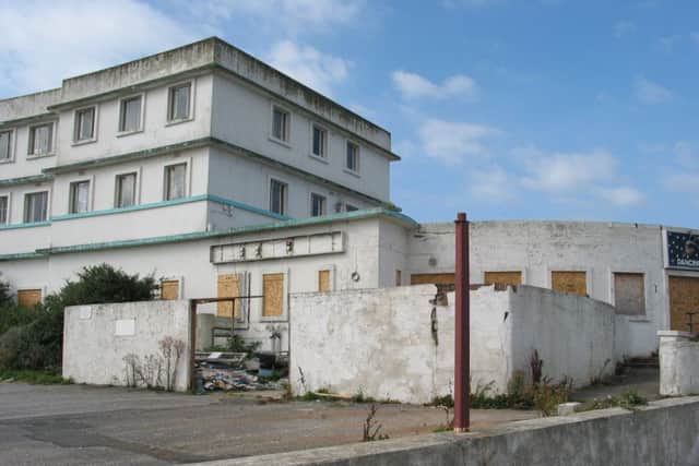 The boarded up Midland hotel before it was renovated.