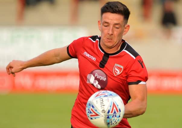 Luke Conlan is staying at Morecambe after signing a new deal
