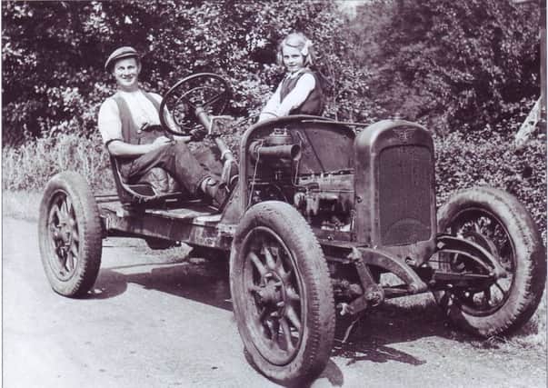 Austin 12HP car tractor, Bottom Mill, Lowgill, 1947. Stephen Middleton and his daughter Marjory, are seated in their Auston car tractor. Stripped down motorcars, such as the one shown here, were quite popular with small farmers and were often used as a cheaper alternative to tractors.