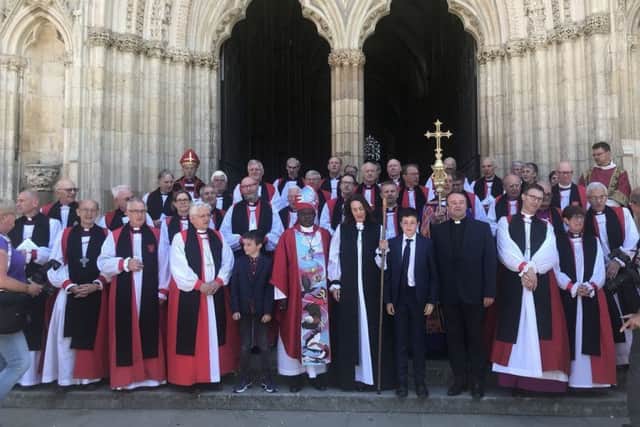 New Bishop of Lancaster Dr Jill Duff, centre, with 40 other bishops at her consecration service in York
