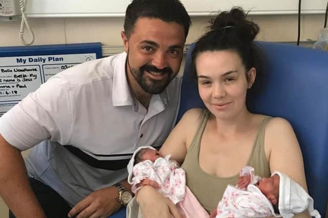 Emma and Paul Woodhouse with twins Jessica and Bella.