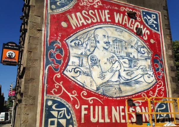 The Massive Wagons mural on the side of The Pub in Lancaster